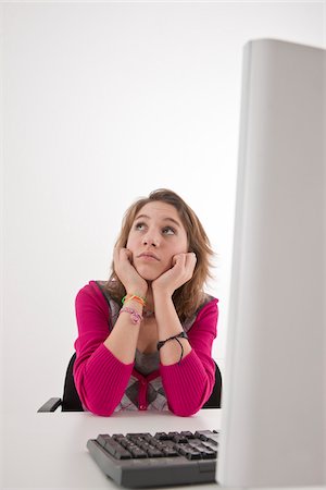 Teenager using Computer Stock Photo - Premium Royalty-Free, Code: 600-03734632