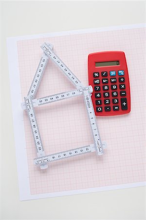 simsearch:600-03782467,k - Folding Ruler in Shape of House with Calculator Foto de stock - Royalty Free Premium, Número: 600-03738125