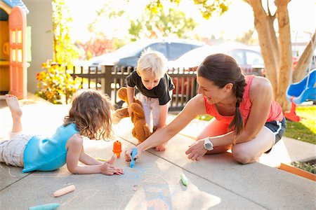 Family Playing on Porch, Newport Beach, Orange County, California, USA Fotografie stock - Premium Royalty-Free, Codice: 600-03738483