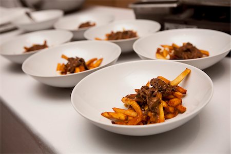 serving food at restaurant - French Fries and Gravy, Toronto, Ontario, Canada Stock Photo - Premium Royalty-Free, Code: 600-03738518