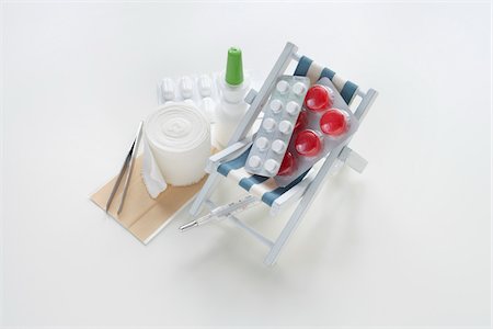 plaster - First Aid Travel Kit and Beach Chair Stock Photo - Premium Royalty-Free, Code: 600-03738808