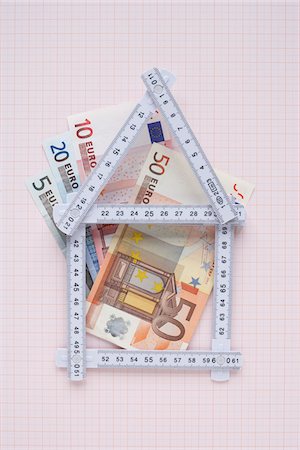 euro - House Made of Expandable Ruler and Euros on Graph Paper Foto de stock - Sin royalties Premium, Código: 600-03738819