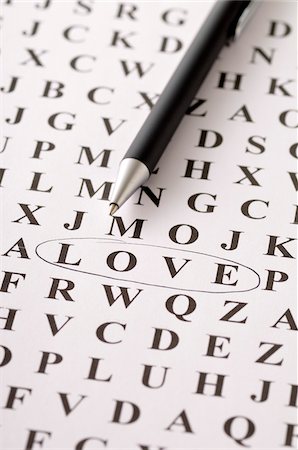 puzzle close up - Word Puzzle with LOVE Circled Stock Photo - Premium Royalty-Free, Code: 600-03768647