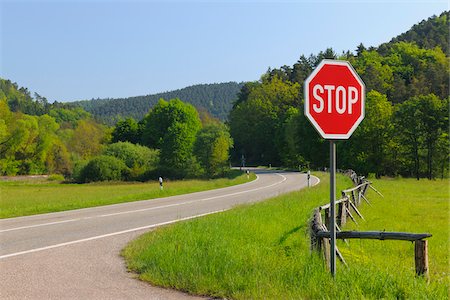 sign boards on roads - Stop Sign on Road, Pfalzerwald, Rhineland-Palatinate, Germany Stock Photo - Premium Royalty-Free, Code: 600-03762454