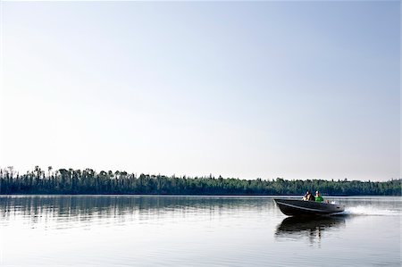 family outdoors in canada - Family Boating, Otter Lake, Missinipe, Saskatchewan, Canada Stock Photo - Premium Royalty-Free, Code: 600-03778008