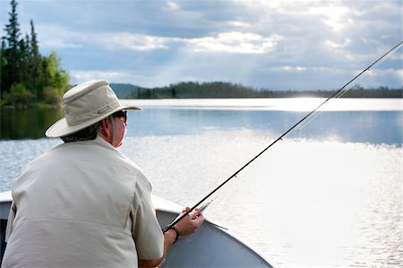 simsearch:600-08167382,k - Man Fishing, Otter Lake, Missinipe, Saskatchewan, Canada Foto de stock - Sin royalties Premium, Código: 600-03778003