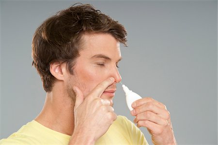 spray - Man Using Nasal Spray Stock Photo - Premium Royalty-Free, Code: 600-03787519