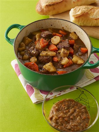 food being cooked - Beef Stew in Pot with Baby Food and Baguette Stock Photo - Premium Royalty-Free, Code: 600-03787636