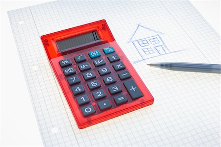 economía personal - Calculator, Pen, Graph Paper and Drawing of House Foto de stock - Sin royalties Premium, Código: 600-03782467