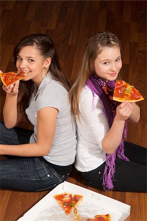 Children Eating Pizza Foto de stock - Sin royalties Premium, Código: 600-03799502