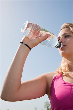 Young Woman Drinking Water Stock Photo - Premium Royalty-Free, Code: 600-03814760