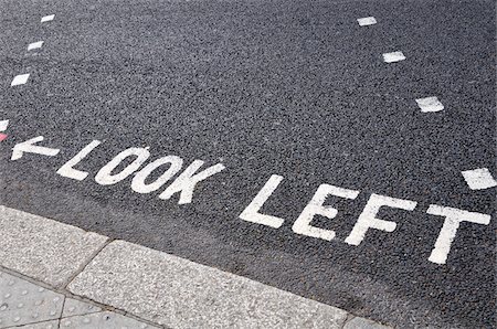 england road photo - Look Left Warning at Crossing on Road Stock Photo - Premium Royalty-Free, Code: 600-03836136