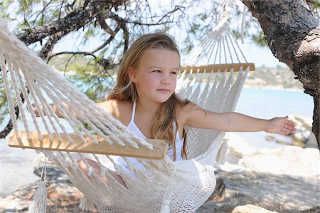 picture of german girls on the beach - Girl in Hammock Stock Photo - Premium Royalty-Free, Code: 600-03836153