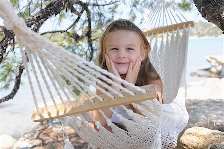picture of german girls on the beach - Girl in Hammock Stock Photo - Premium Royalty-Free, Code: 600-03836192