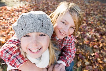 smiling boy girl hugging outdoors - Portrait of Boy and Girl in Autumn Stock Photo - Premium Royalty-Free, Code: 600-03848745