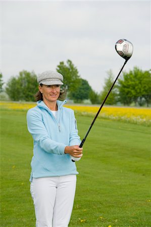 Woman Golfing, Berchtesgaden, Berchtesgadener Land, Oberbayern, Bavaria, Germany Stock Photo - Premium Royalty-Free, Code: 600-03848834