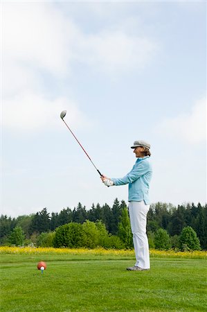 Woman Golfing, Berchtesgaden, Berchtesgadener Land, Oberbayern, Bavaria, Germany Stock Photo - Premium Royalty-Free, Code: 600-03848835