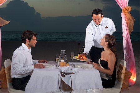 Couple Dining on Beach, Reef Playacar Resort and Spa, Playa del Carmen, Mexico Stock Photo - Premium Royalty-Free, Code: 600-03849564