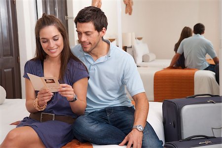 person reading greeting card - Couple, Reef Playacar Resort and Spa Hotel, Playa del Carmen, Quintana Roo, Yucatan Peninsula, Mexico Stock Photo - Premium Royalty-Free, Code: 600-03849605