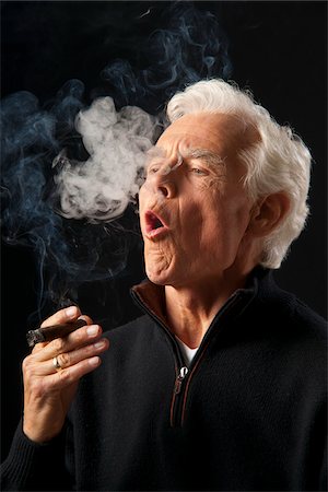 smoker older men - Man Smoking Cigar Stock Photo - Premium Royalty-Free, Code: 600-03865037