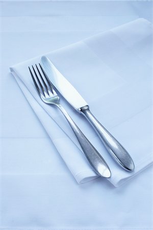 fork (cutlery) - Close-up of Cutlery and Napkin Stock Photo - Premium Royalty-Free, Code: 600-03907412