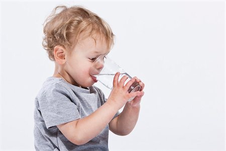 drinking glass - Boy Drinking Water Stock Photo - Premium Royalty-Free, Code: 600-03907550