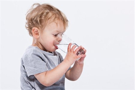 profile drinking - Boy Drinking Water Stock Photo - Premium Royalty-Free, Code: 600-03907550