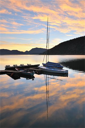 Dock and Boats at Sunrise, Lake Walchen, Einsiedl am Walchensee, Bavaria, Germany Stock Photo - Premium Royalty-Free, Code: 600-03979813