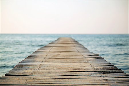 dock and horizon picture - Empty jetty and seascape Stock Photo - Premium Royalty-Free, Code: 614-05399459