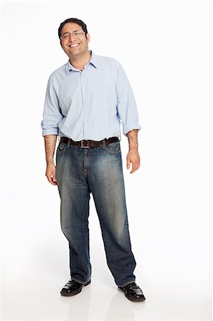 Portrait d'homme adulte moyen sur fond blanc Photographie de stock - Premium Libres de Droits, Code: 614-05523032