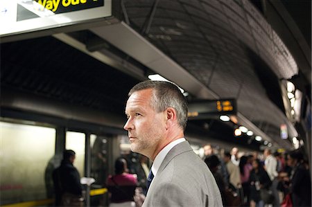 people waiting at a subway station - Businessman in subway station Stock Photo - Premium Royalty-Free, Code: 614-05556719