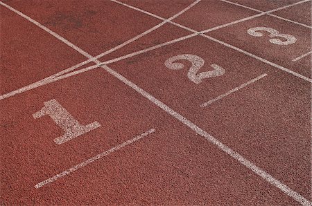 Close up of running track start lines Foto de stock - Sin royalties Premium, Código: 614-05662163