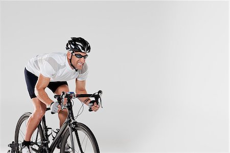 sports and cycling racing - Déterminé cycliste masculin Photographie de stock - Premium Libres de Droits, Code: 614-05792258