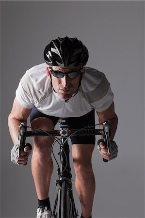 simsearch:694-03474723,k - Male cyclist Stock Photo - Premium Royalty-Free, Code: 614-05792262