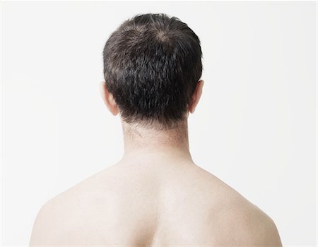 Head and shoulders of man, rear view Stock Photo - Premium Royalty-Free, Code: 614-05792287