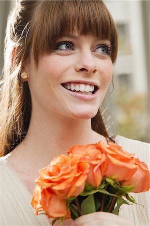 peach color - Potrait of a bride with roses Stock Photo - Premium Royalty-Free, Code: 614-05792401