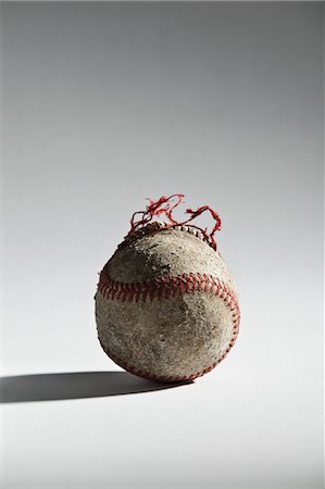 Worn baseball Stock Photo - Premium Royalty-Free, Code: 614-05792434