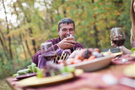 red wine celebration - Mature man at outdoor dinner Stock Photo - Premium Royalty-Free, Code: 614-05792561