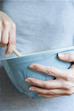 simplicity - Woman with mixing bowl Stock Photo - Premium Royalty-Free, Code: 614-05819022