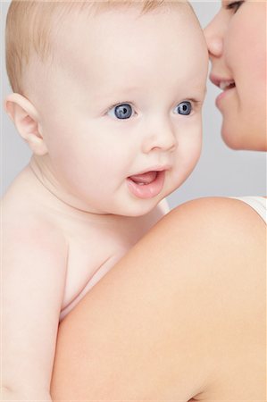 shoulders mom - Baby boy and mother Stock Photo - Premium Royalty-Free, Code: 614-05819045