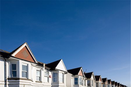 street suburb - Houses and blue sky Stock Photo - Premium Royalty-Free, Code: 614-05819042