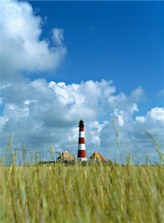 schleswig-holstein - Westerhever lighthouse, coast of North Sea, Schleswig-Holstein, Germany Fotografie stock - Premium Royalty-Free, Codice: 614-05819120