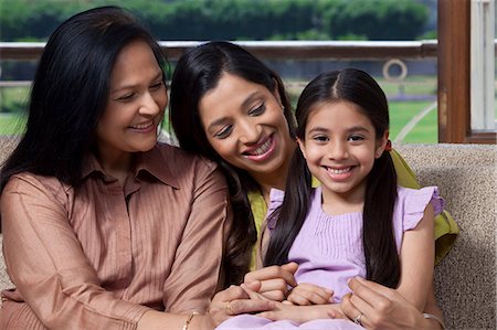 family indoors old - Girl with mother and grandmother on sofa Stock Photo - Premium Royalty-Free, Code: 614-05955283