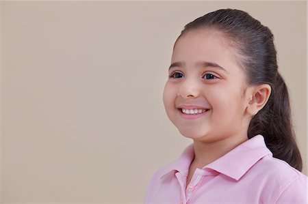 Jeune fille souriant Photographie de stock - Premium Libres de Droits, Code: 614-05955360