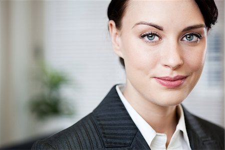 dark hair - Portrait of a young businesswoman Stock Photo - Premium Royalty-Free, Code: 614-05955686