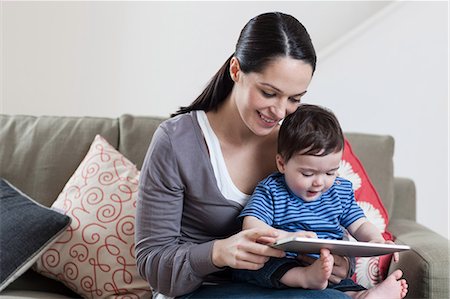 simsearch:614-05955643,k - Mother and baby looking at digital tablet Stock Photo - Premium Royalty-Free, Code: 614-05955680