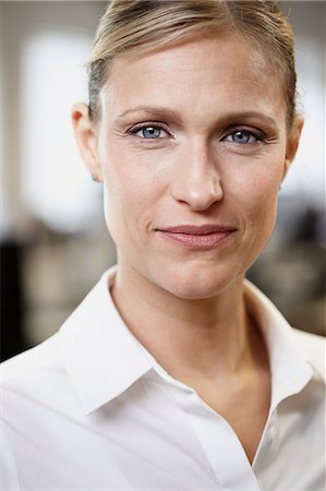 strong depth of field - Portrait of a businesswoman Stock Photo - Premium Royalty-Free, Code: 614-05955695