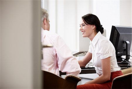 door office - Colleagues talking in office Stock Photo - Premium Royalty-Free, Code: 614-05955710