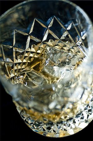 drinks with ice - Whiskey on the rocks in a tumbler Stock Photo - Premium Royalty-Free, Code: 614-06002074