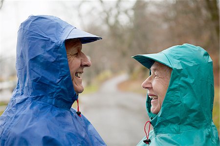 Senior couple face to face in waterproof clothing Stock Photo - Premium Royalty-Free, Code: 614-06002123